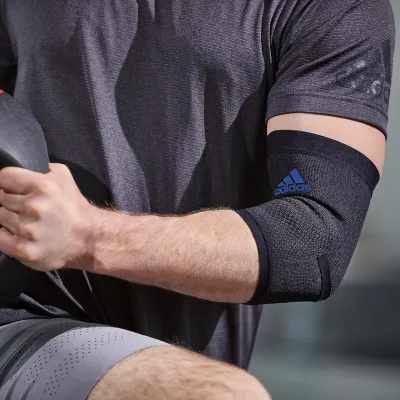 Фіксатор ліктя Adidas Performance Elbow Support чорний.синій Уні M ADSU-13332BL M - 1 - Robinzon.ua