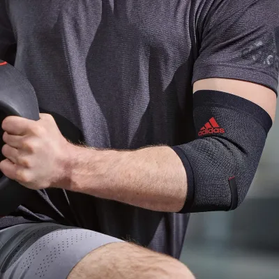 Фіксатор ліктя Adidas Performance Elbow Support чорний,червоний Уні S ADSU-13331RD S - 1 - Robinzon.ua