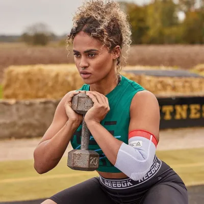 Фіксатор ліктя Reebok Speedwick Elbow Support білий, червоний Уні L RRSU-14523 L - 2 - Robinzon.ua