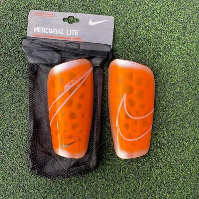 Футбольні щитки Nike Mercurial Lite - 1 Футбольні щитки Nike Mercurial Lite - 1 - Robinzon.ua