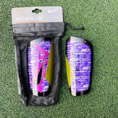 Футбольні щитки Nike Mercurial Lite - 1 Футбольні щитки Nike Mercurial Lite - 1 - Robinzon.ua