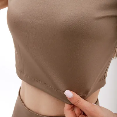 Жіноча Футболка New Balance Athletics Pearl Коричневий S (WT31556MS) - 1 - Robinzon.ua